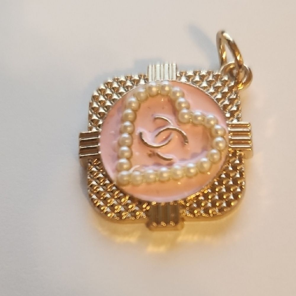 CHANEL Pink and Gold Necklace with Heart Motif
